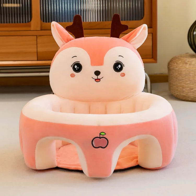 Cute pink deer plush baby chair with antlers and apple embroidery in living room