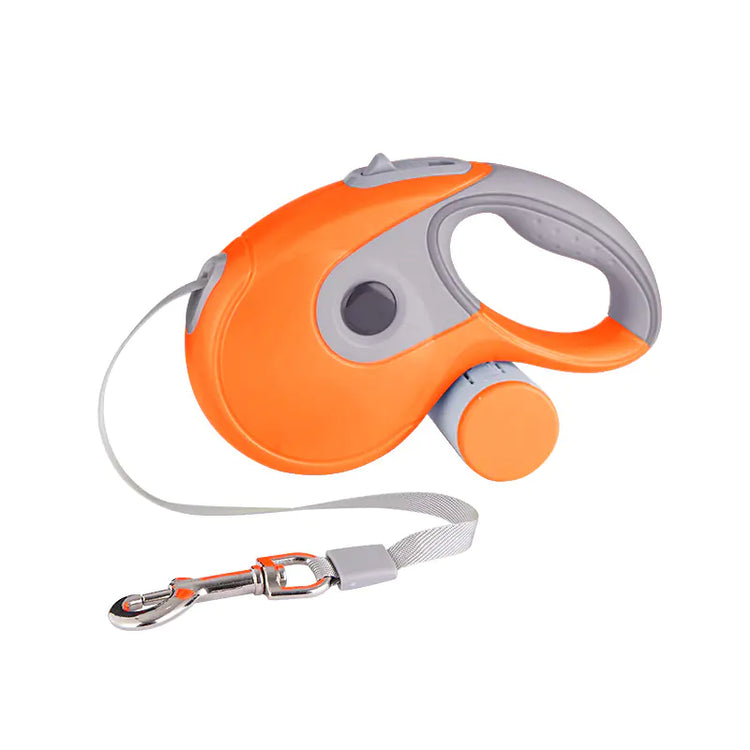 Orange and gray retractable dog leash with ergonomic handle on white background