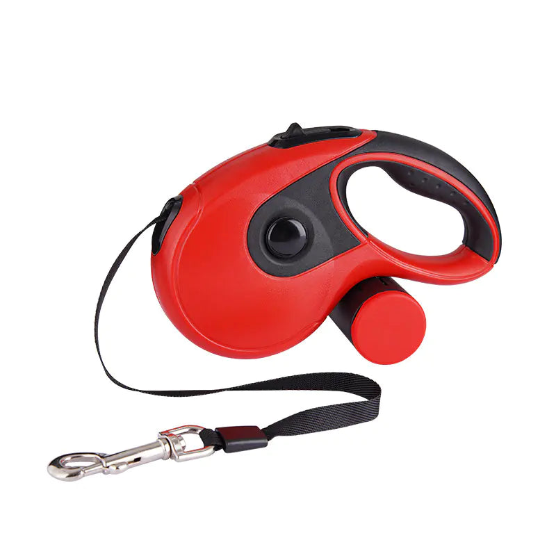 Red retractable dog leash with black handle and metal clip on a white background