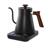 Black gooseneck electric kettle with wood handle on digital base