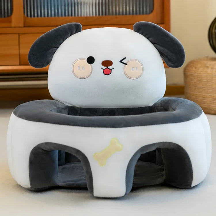 Plush dog-shaped kids chair with floppy ears and bone design, in a cozy room setting
