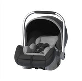 Modern black and gray infant car seat with canopy and carrying handle on white background