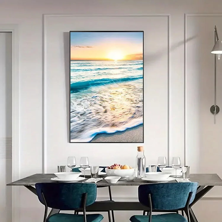 Modern dining room with blue chairs and a large ocean sunset wall art above the table
