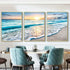 Modern dining room with blue velvet chairs and coastal beach wave wall art triptych