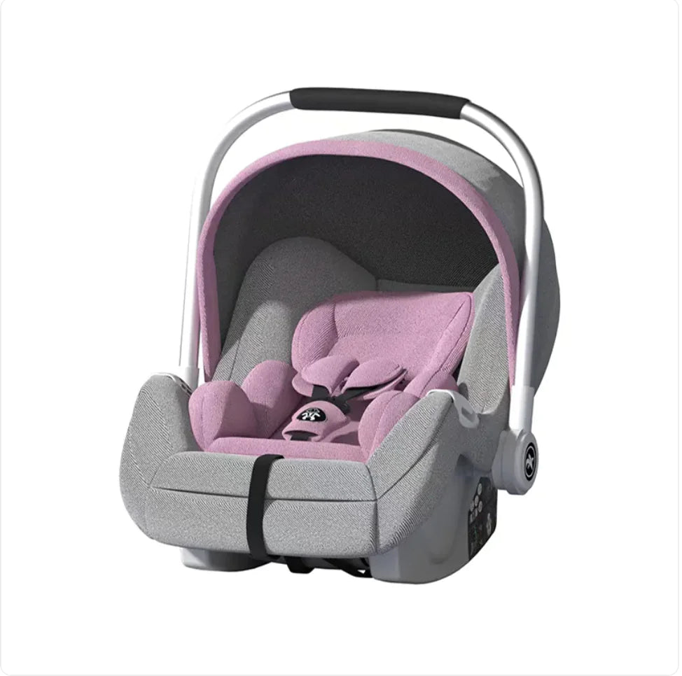 Gray and pink infant car seat with canopy and carrying handle on white background