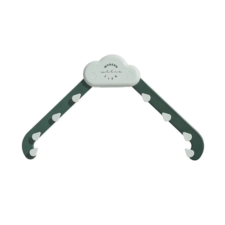 Cloud-shaped plastic clothes hanger with green arms and white hooks, Modern Life text