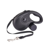 Black retractable dog leash with ergonomic handle and metal clip