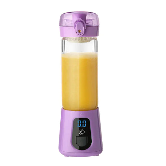 Purple portable blender with digital display and orange juice inside