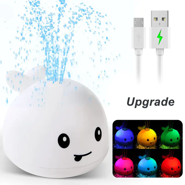 Cute whale-shaped night light with water spray, USB charging, and colorful LED modes.