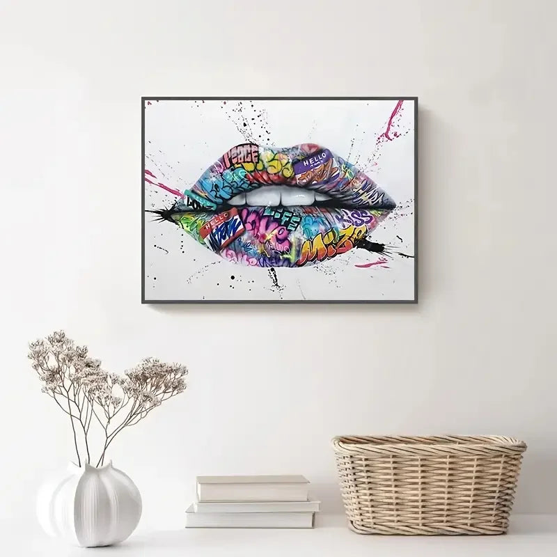 Colorful graffiti lips wall art above white console with vase and wicker basket