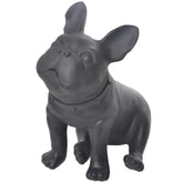 Black French bulldog statue with collar, sitting on a white background
