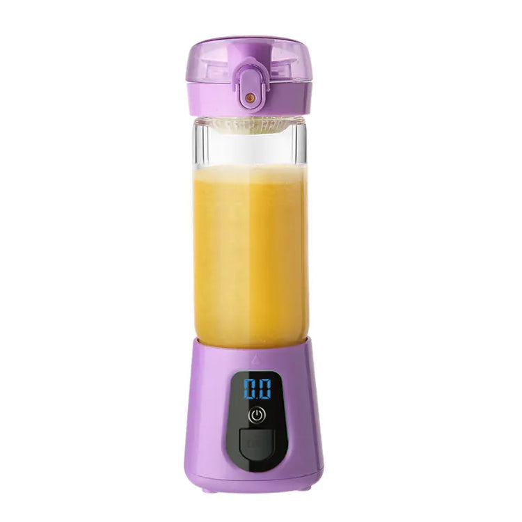 Purple portable blender with digital display blending orange juice